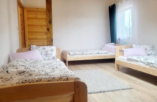 Apartamenty i pokoje gościnne pod lasem