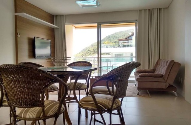 Apartment 207 facing the sea, standing on the sand. Costão do Santinho Beach