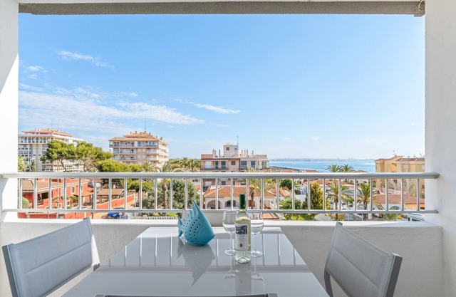 Apartment 'Beach Front Sea View Punta Prima' with Sea View, Wi-Fi and Air Conditioning