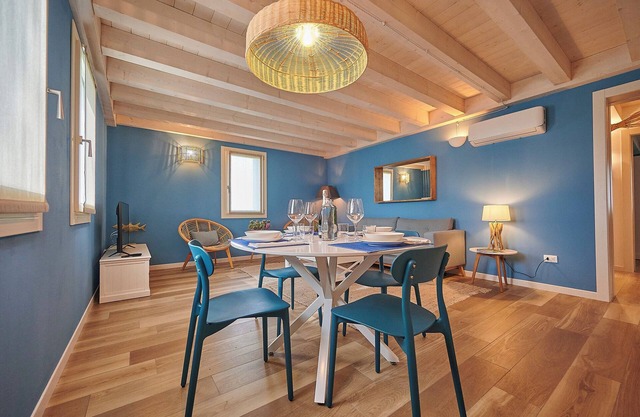 Apartment 'Ca' Marano Ocean' with Shared Pool, Wi-Fi and Air Conditioning