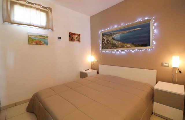 Apartment 'Casa Vacanza Lu Mare' with Garden & Wi-Fi