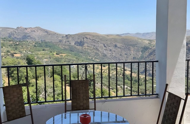 Apartment 'Chaparra Pitres Apart Atalbéitar' with Mountain Views, Shared Pool and Wi-Fi