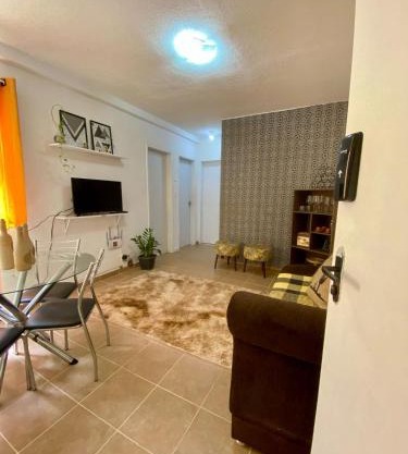 Apto econômico e mobiliado a 2km do shopping com garagem e Wi-Fi