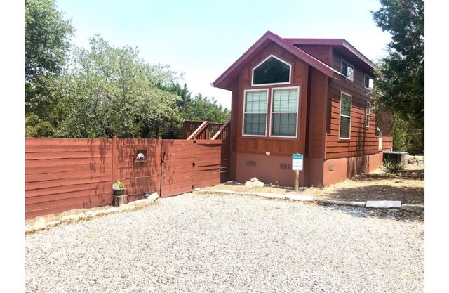 Armadillo cabin in a boutique gated tiny home resort with pool!
