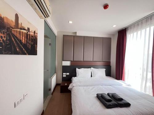 Astra changklan road 清迈市区Astra 豪华公寓两卧室 毗邻香格里拉大酒店 步行可至长康路夜市 位于市中心 健身房 泳池