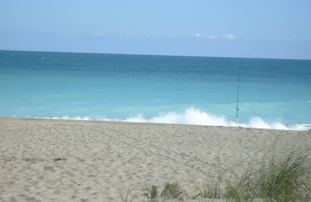 At the heart of Ocean Village. Private beach, gym, tennis, golf, pools, etc.