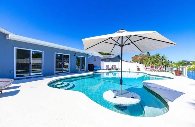 Bayside Retreat with Backyard Oasis