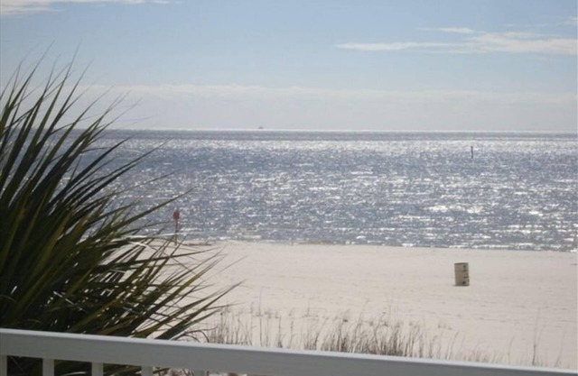 BEACH FRONT CONDO JUST STEPS FROM THE POOL AND BEACH! NEW $189 NIGHTLY RATE.