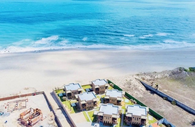 Beachfront fully-equipped 2-bedroom house near Beach Park with AC, WiFi.