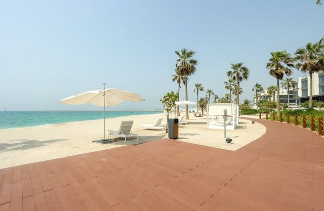 Beachfront Ultra 4BR Duplex | Sea & Burj Views