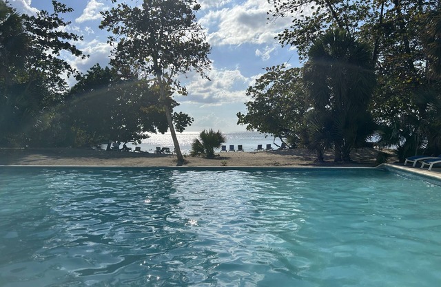 Beachhouse Villa located on a small bluff on a private beach. Ideal for families