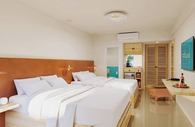 Beachside Balcony Room | Double Queens + Rooftop Drinks & Pool