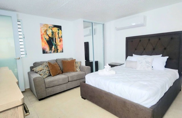 Beachside Bliss: Nestled by Shops & Dining - Only a Mile to Waves