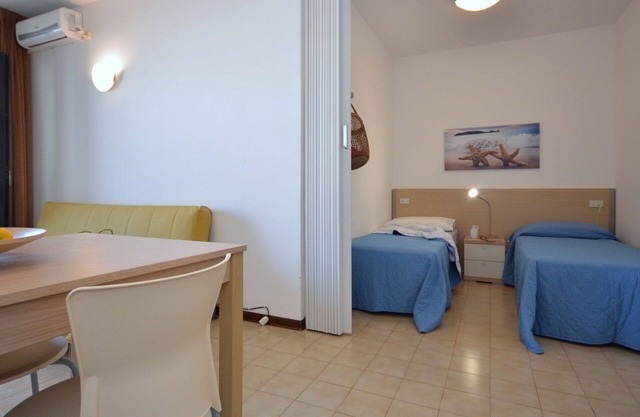Beautiful apartment for 4 people with A/C, pool, TV, terrace and pets allowed