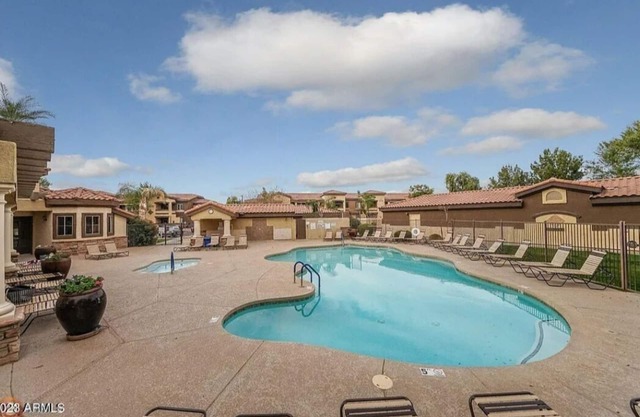 Beautiful condo in Gated community with 2 pools, club house and work out room!