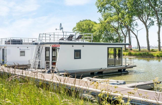 Beautiful houseboat overlooking the water