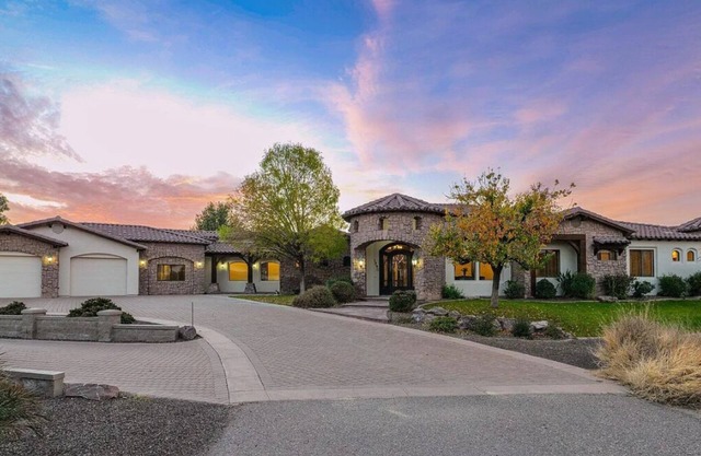 Beautiful oasis with pool, pickleball courts, putting green, 13’ theatre screen