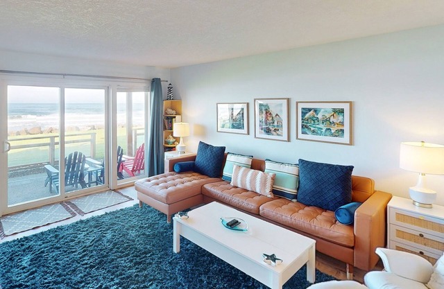 Beautiful ocean front condo with stunning views, WiFi, steps to beach