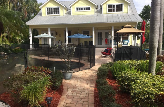 Beautiful private home Heated pool/waterfall & only 5 min to the local beaches.