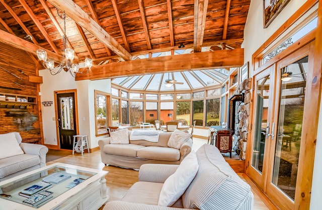 Beautiful, rustic home w/on-site playground, deck, patio, grill, and fireplace