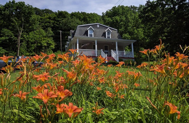 Beautiful, spacious home on Yough River and bike trail with hot tub