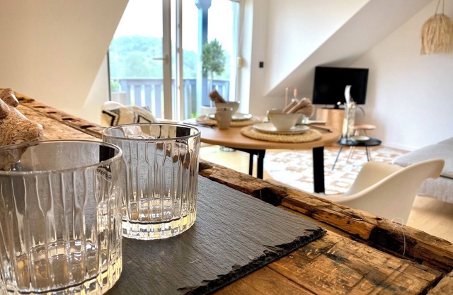 BioLoft by the lake and distant views. Cozy vacation apartment on the top floor