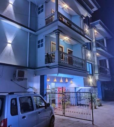 Blue building Service Apartments and kitchen Facility