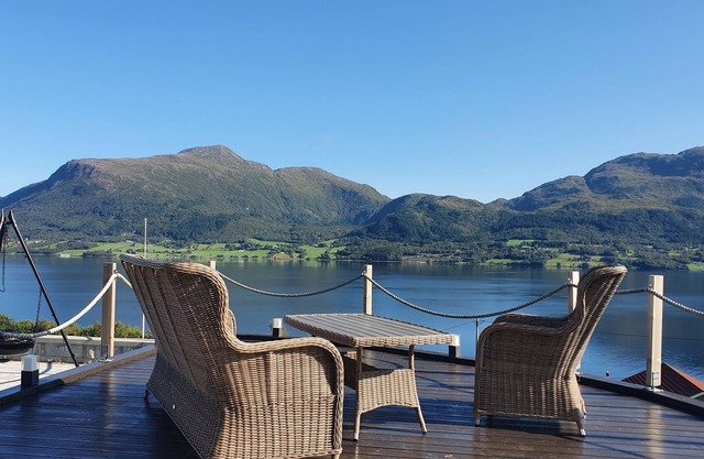 Boat is 2 km from Kvernesfjorden Apartments