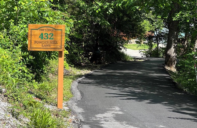 Breathtaking views from private custom log house with easy walk to private dock.