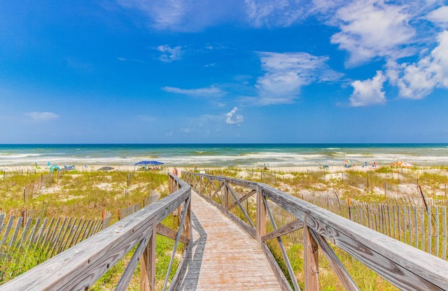 Breezy townhome with shared pool & tennis, beach access - small dogs welcome