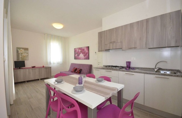 Bright apartment with private fenced garden