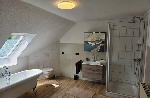 Bright vacation apartment in East Frisia with large garden and terrace