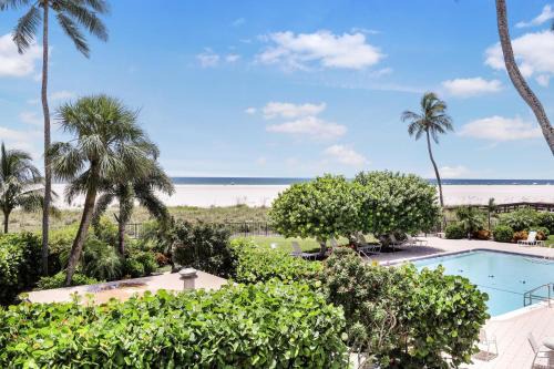 Bungalow-style beachfront condo with pool