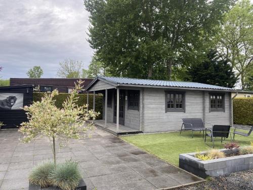 Cabin in Tzummarum with Pool and Tennis Court