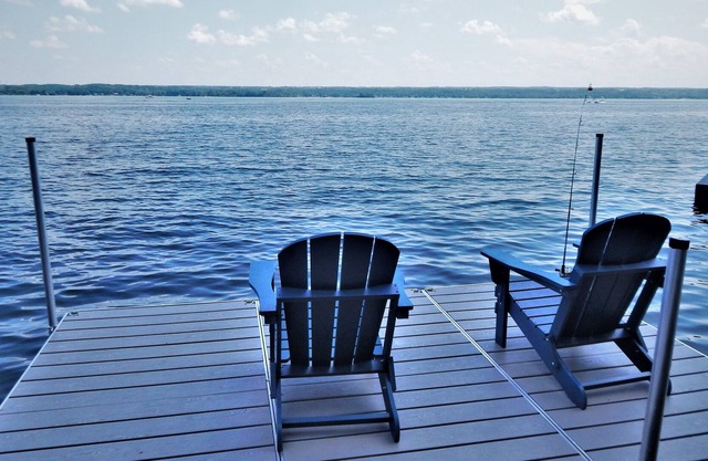 Calm on Cayuga. Lakefront home on Cayuga Lake with dock and screened in porch