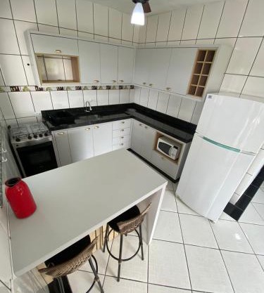 Casa agradável com piscina e churrasqueira