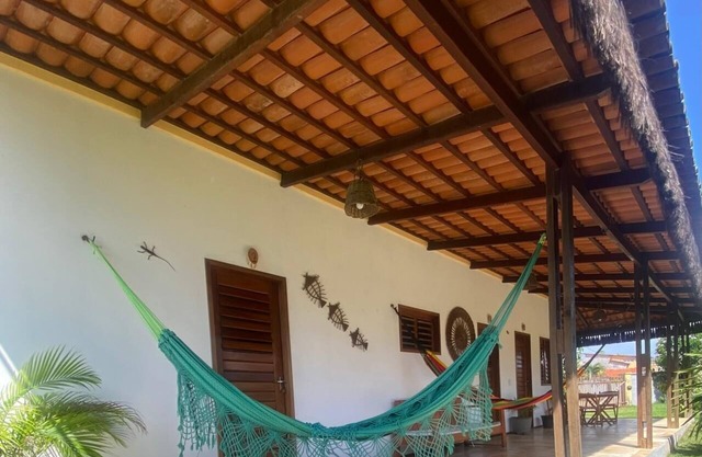 casa localizada em guajiru, casa que oferece tranquilidade e conforto