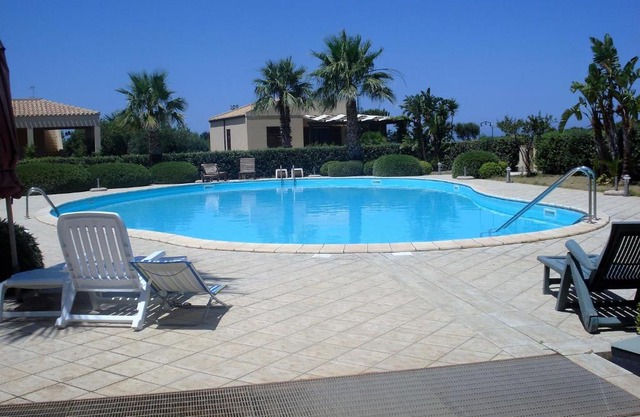 Casa Vacanze Libeccio - Villetta con giardino e piscina condominiale