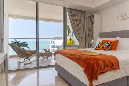 CB1528 | Suite balcón lounge vista al mar 15 piso