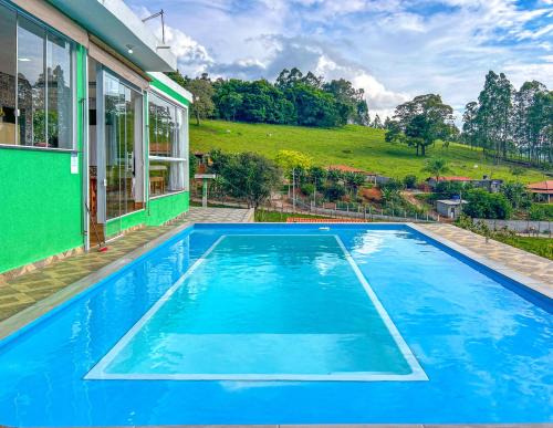 Chacara com WiFi, piscina,churrasqueira e conforto