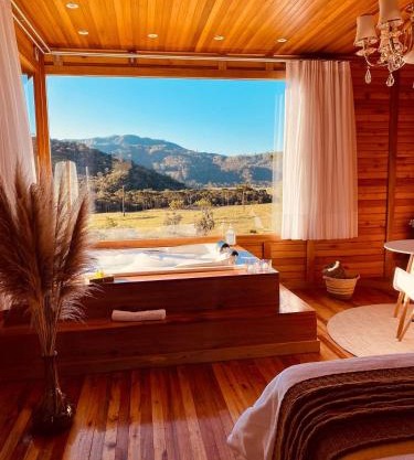 Chalé Romântico com jacuzzi e café da manhã em Rancho Queimado