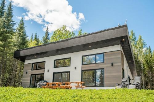 Chalet à louer au bord d'un lac avec spa