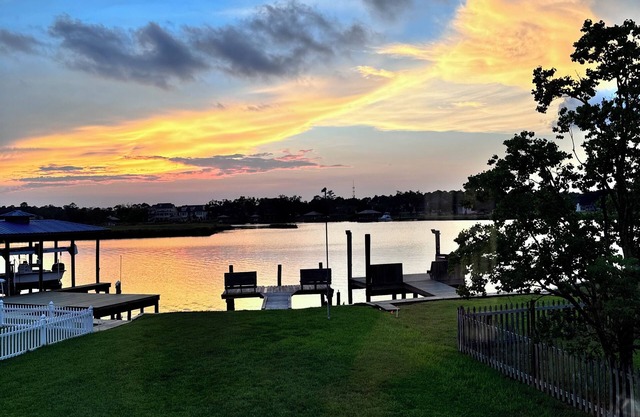 Charming 2 bedroom 2 bath waterfront property located minutes from the beach.