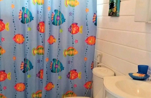 Charming beach waterfront home with panoramic views of the bay of Porto-Mirim.