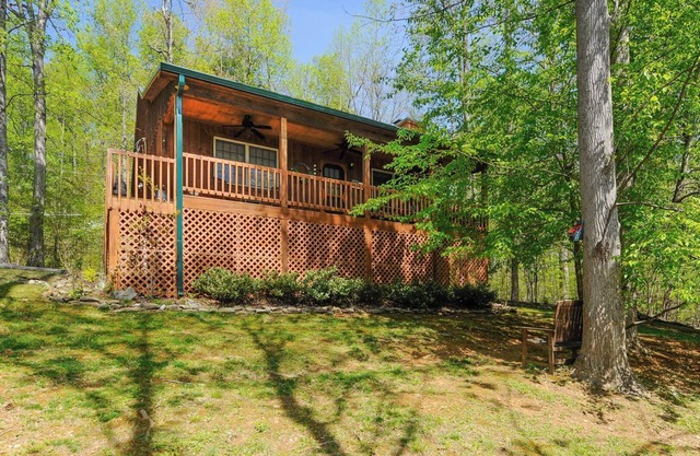 Charming Rustic Cabin. Great covered porch to enjoy during your stay.