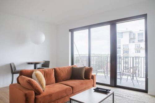 Chic East Side 1BR Apt with Balcony, Pool, and Gym