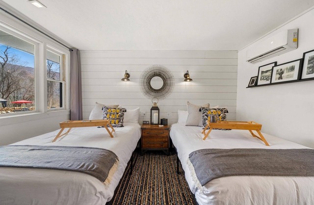 Chic Modern Farmhouse Retreat Featuring a Peaceful Garden Gazebo and Fire Pit View