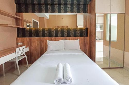 Classic Studio at Student Castle Yogyakarta Apartment By Travelio