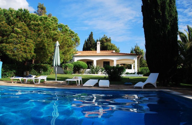 Cliff top villa set in a luxuriant garden with sea view