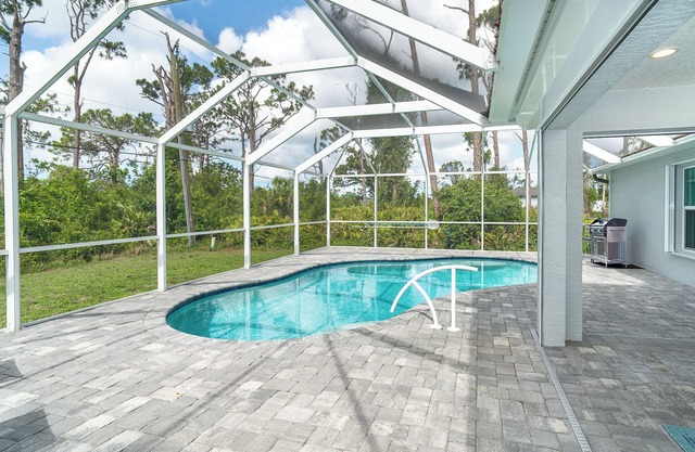 Coastal Comfort in Gulf Cove Relaxing 3BR Retreat w/Heated Pool